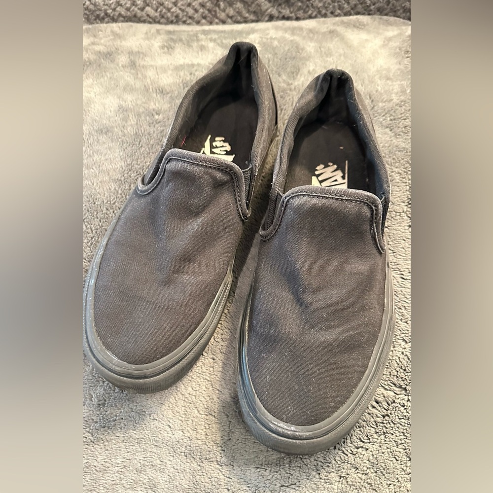 Vans women's Classic Black Slip-On Sneakers